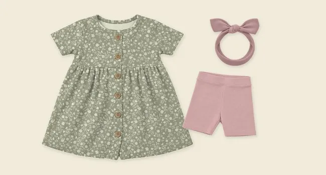 Flat lay: Penelope Dress with Rose Biker Shorts and a Knotted Headband