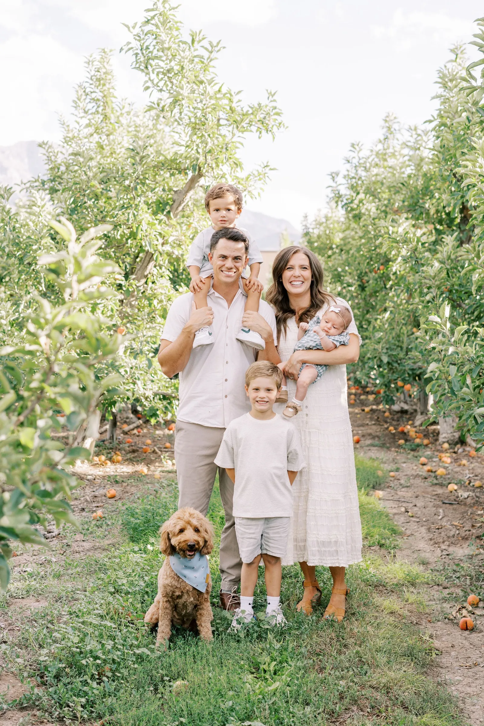 The family in an apple orchard