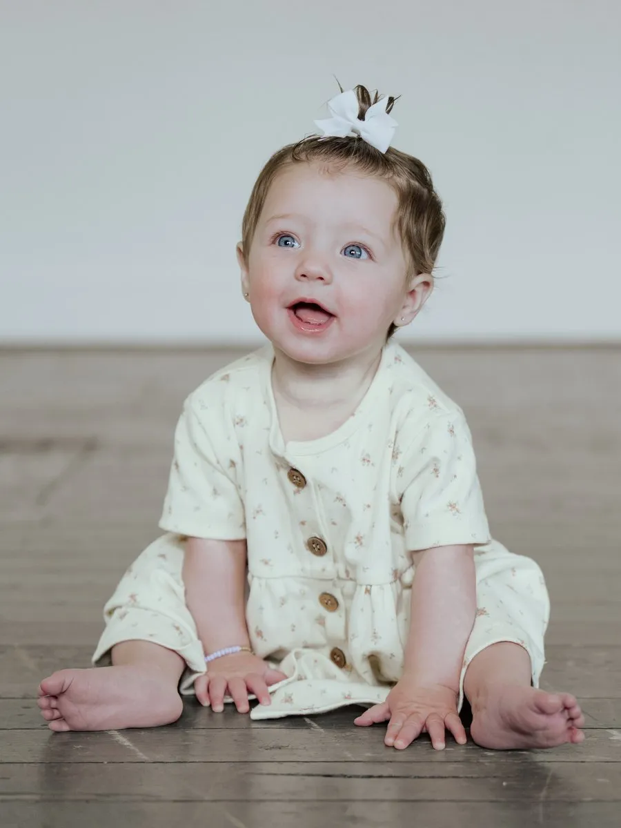 A child in the BRIN Penelope Dress, Emily Floral, from BRIN's launch photoshoot