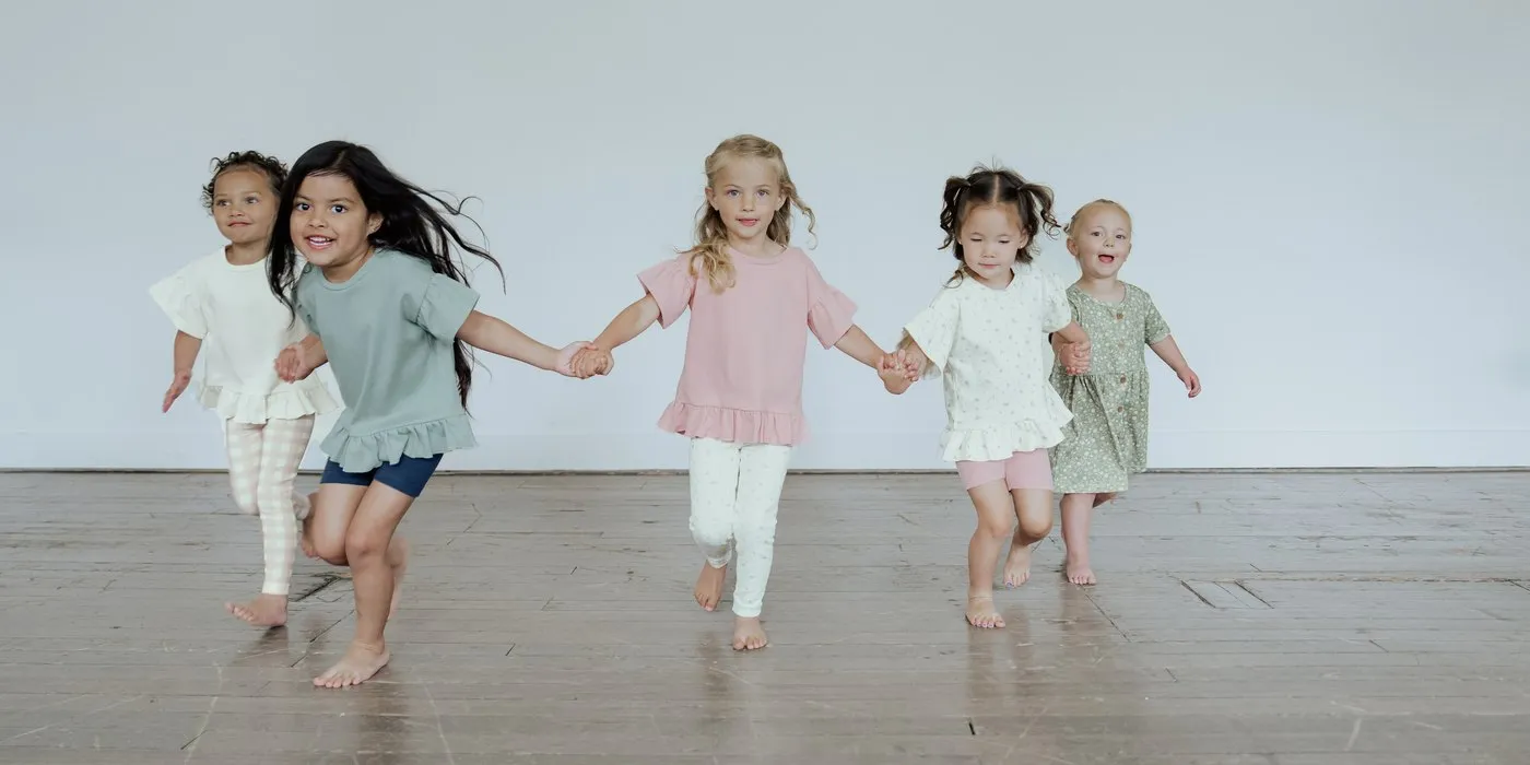 Five toddlers in BRIN running hand in hand