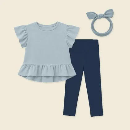 Flat lay: Cloud Blue Evie Peplum, Indigo Leggings and a Cloud Blue Knotted Headband