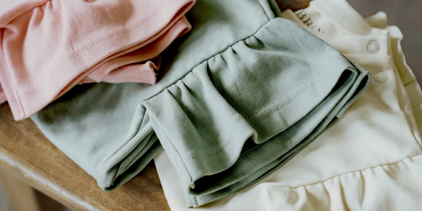 Close-up of three Evie Peplum ruffles